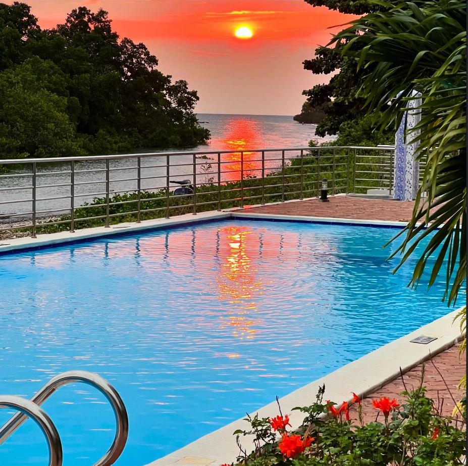 Al-Saadi Apartments — swimming pool at sunset, Zanzibar