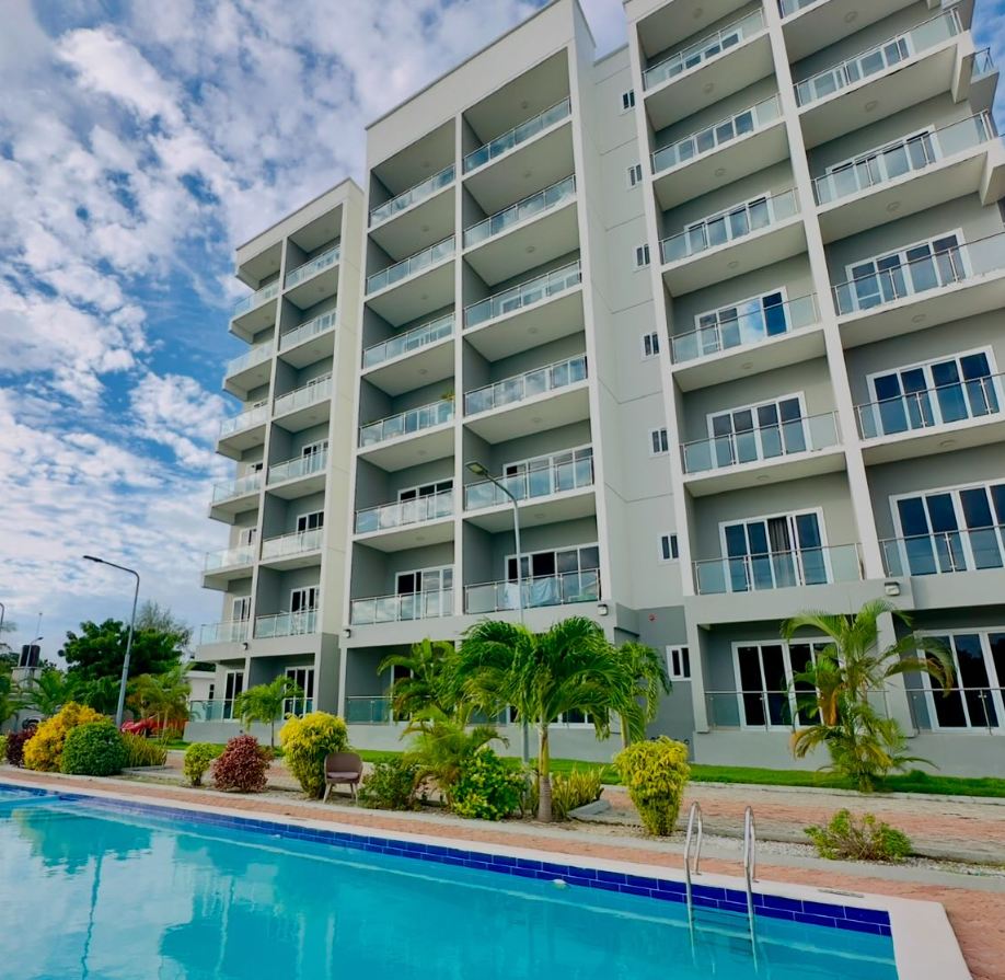 Al-Saadi Apartments — completed building with swimming pool, Zanzibar